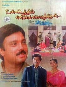 Watch Unnidathil Ennai Koduthen